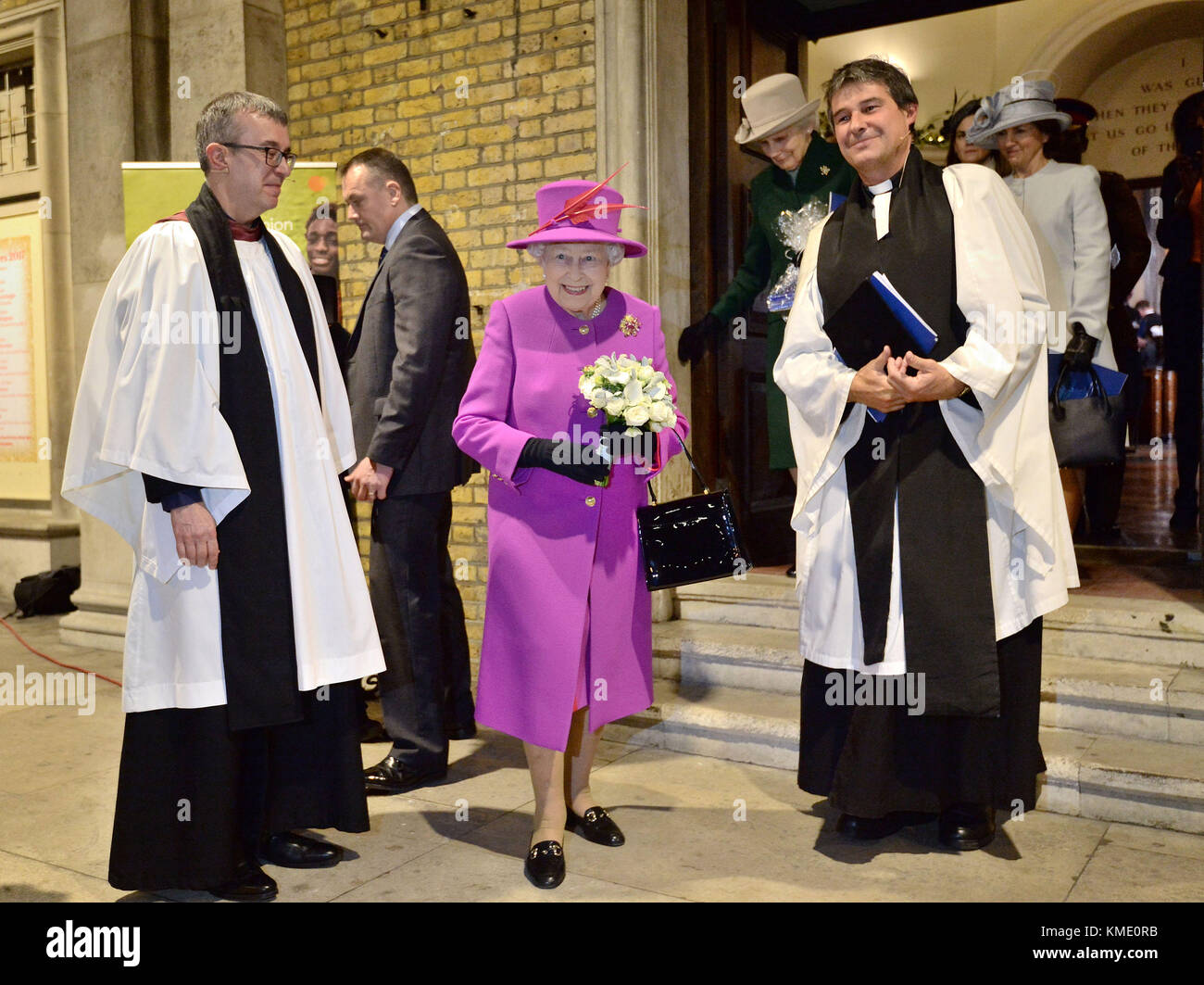 Queen Elizabeth II leaves after the Scripture Union's 150th anniversary service of celebration at St Mary's Church in London. Stock Photo