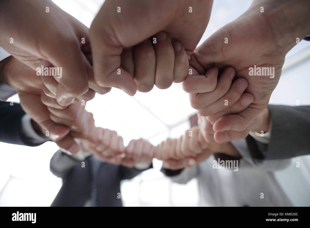 group of people joined their hands Stock Photo - Alamy