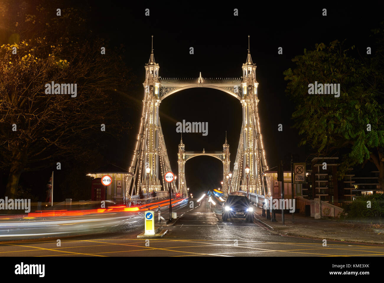 Albert Bridge London at night looking South with light trails Stock Photo