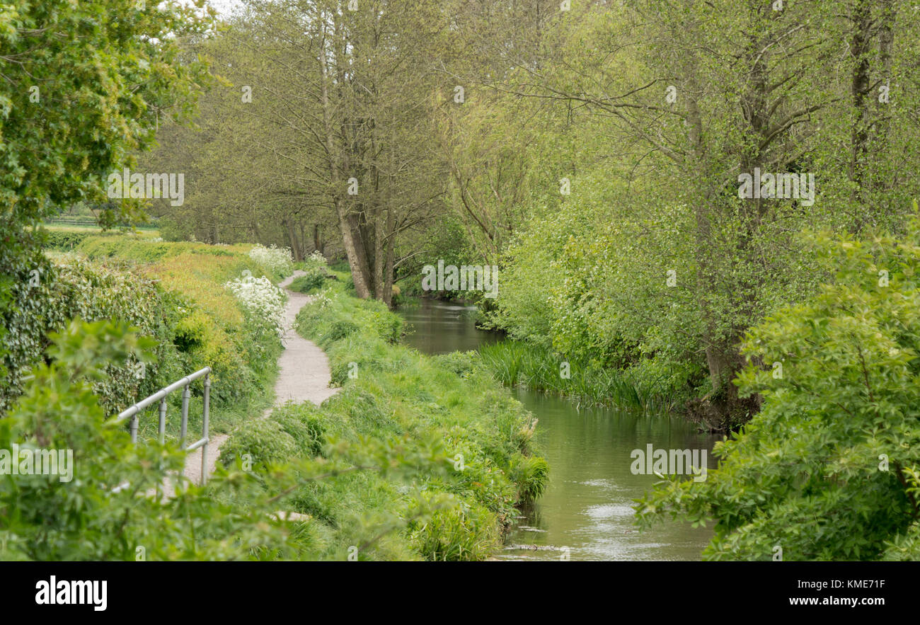 Stream running through village of Kingswood, Gloucestershire. The Abbey