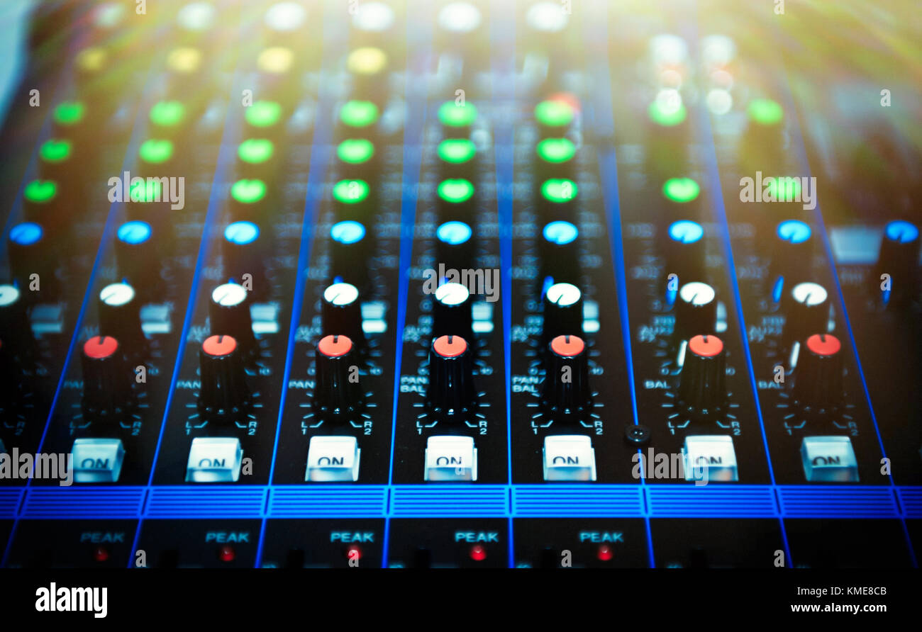 Detail of a music mixer desk with various knobs Stock Photo Alamy