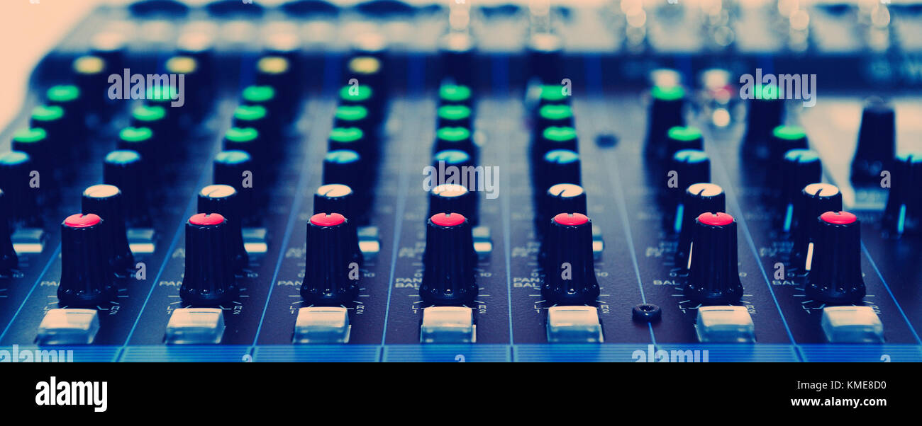 Detail of a music mixer desk with various knobs Stock Photo Alamy