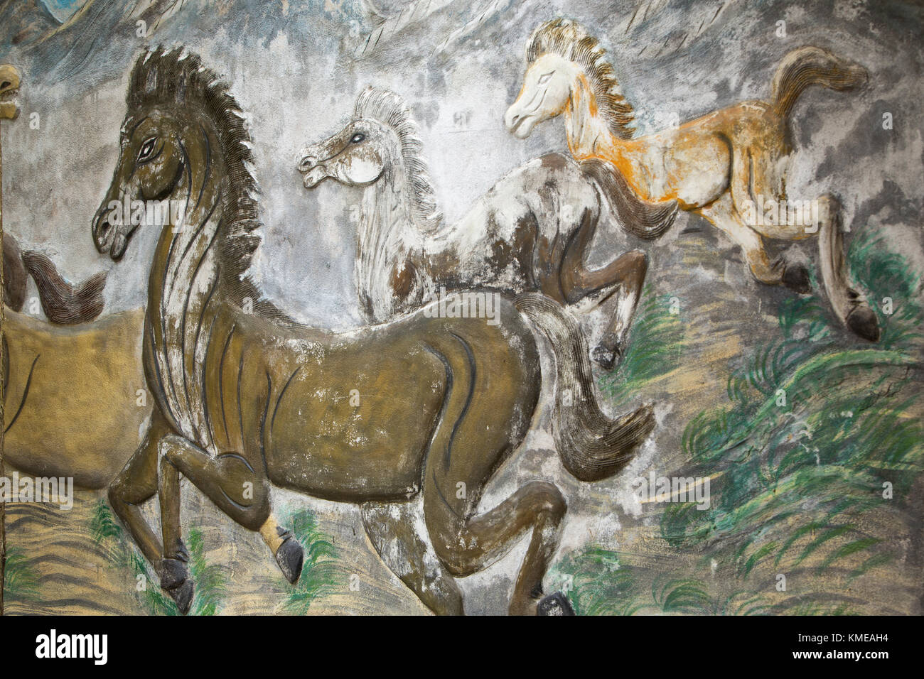 Painting on structure,  artist rendition,  herd of galloping horses in nature, Vietnam. Stock Photo