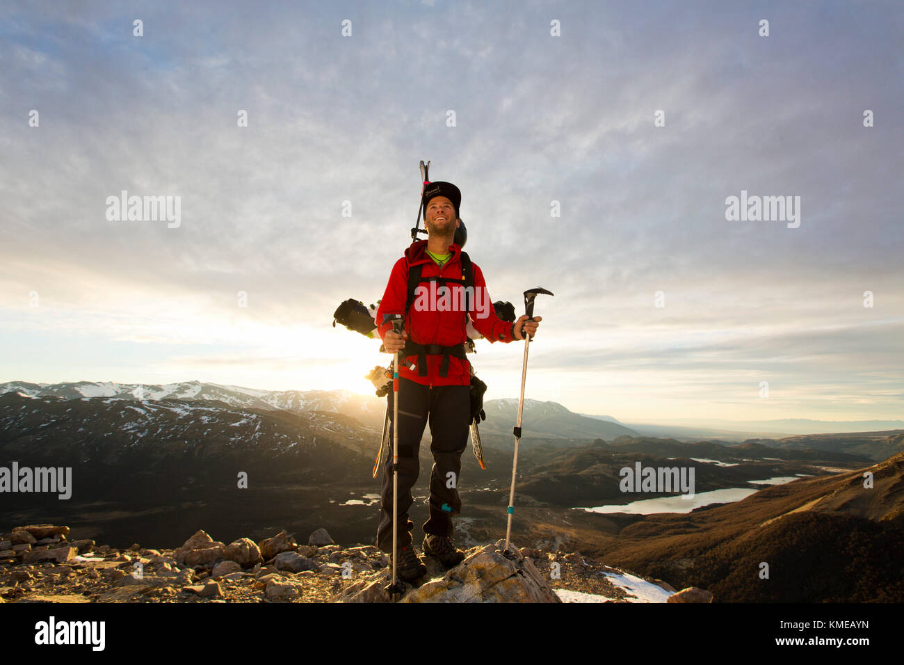 Young man hiking at sunrise, El Chalten, Patagonia, Argentina Stock Photo
