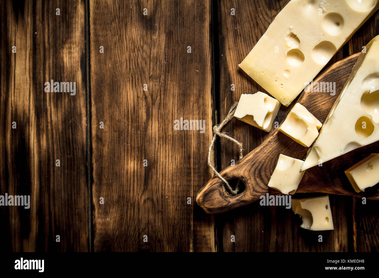Pieces of fresh cheese on a cutting Board Stock Photo Alamy