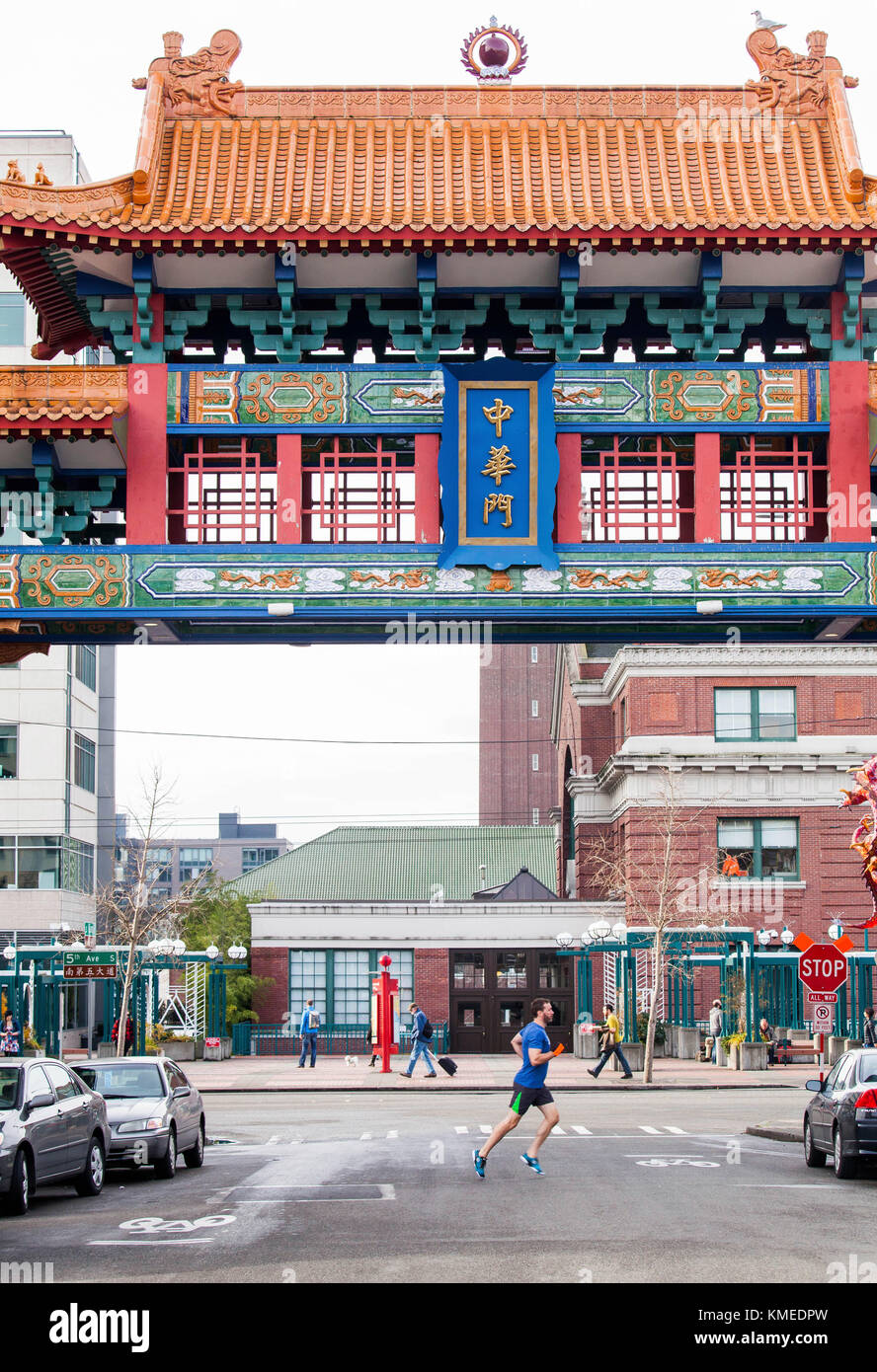 A runner jobs through Chinatown in Seattle, WA Stock Photo Alamy
