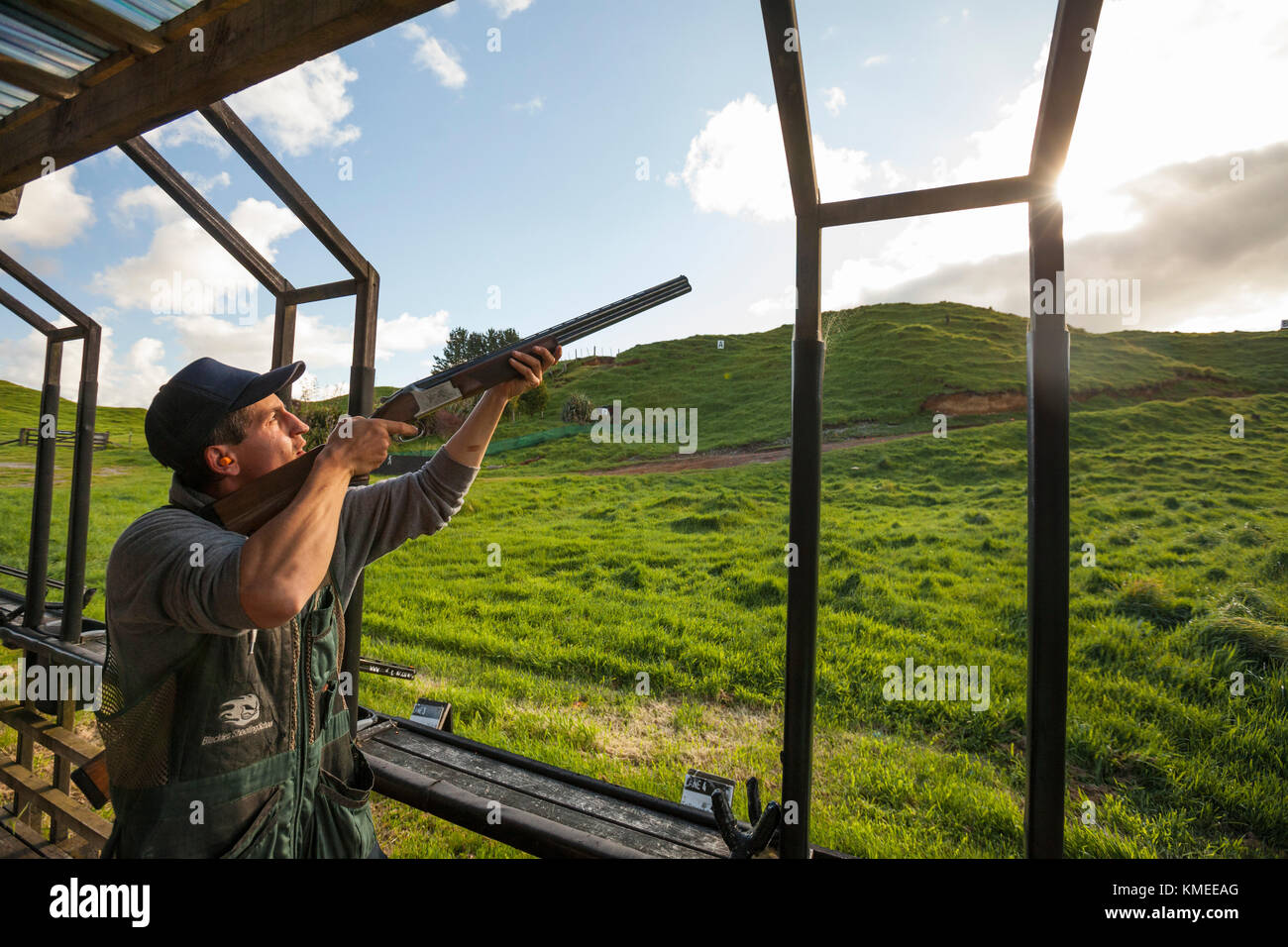 Man aiming shotgun,Tauranga,Bay of Plenty,New Zealand Stock Photo