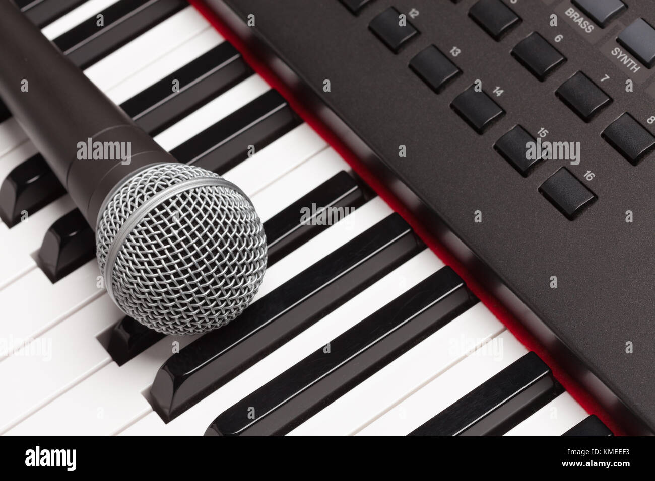 Microphone Laying on Electronic Synthesizer Keyboard Abstract Stock
