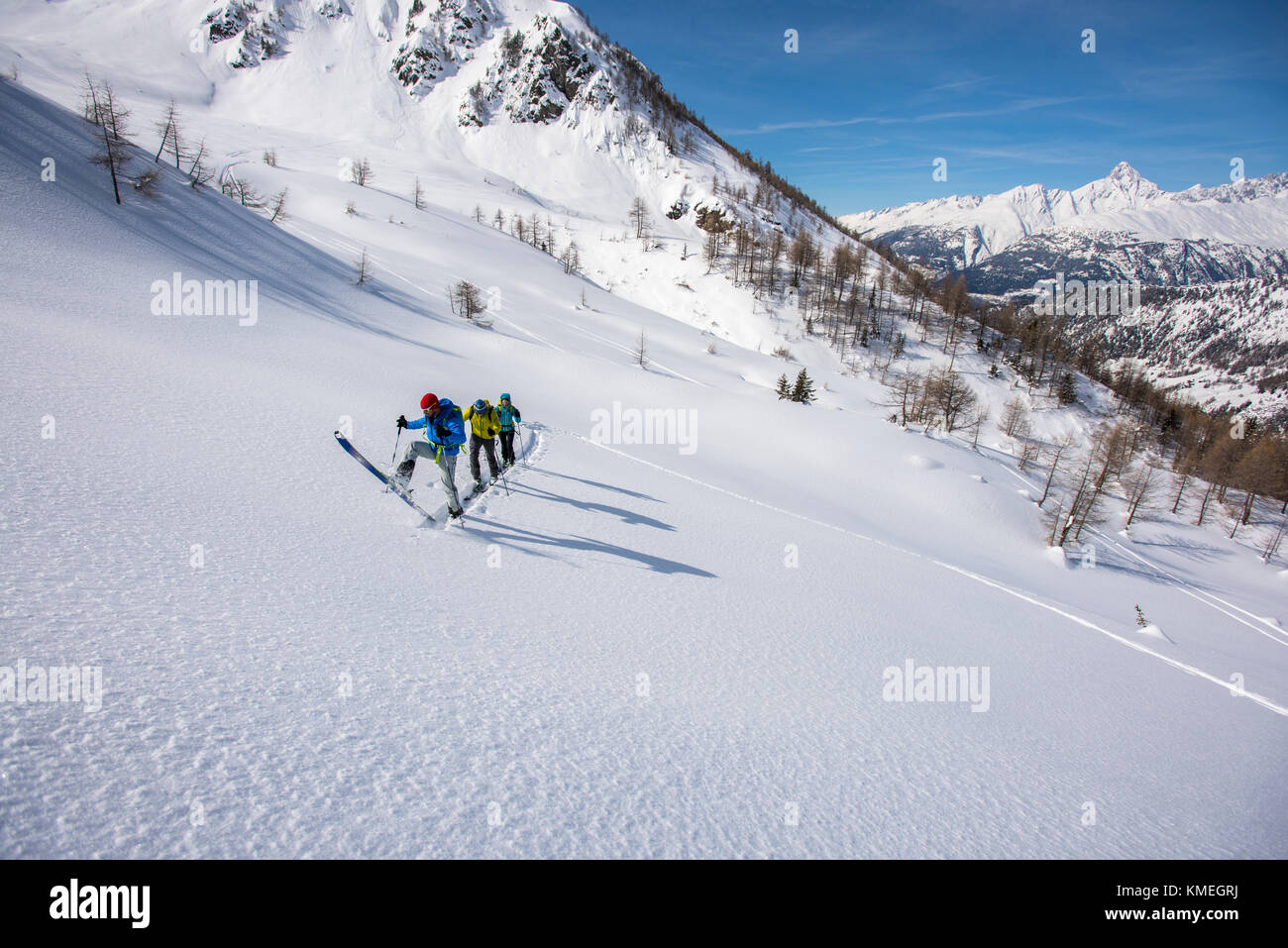 Ski touring on a powder day in Simplonpass, Switzerland. Stock Photo