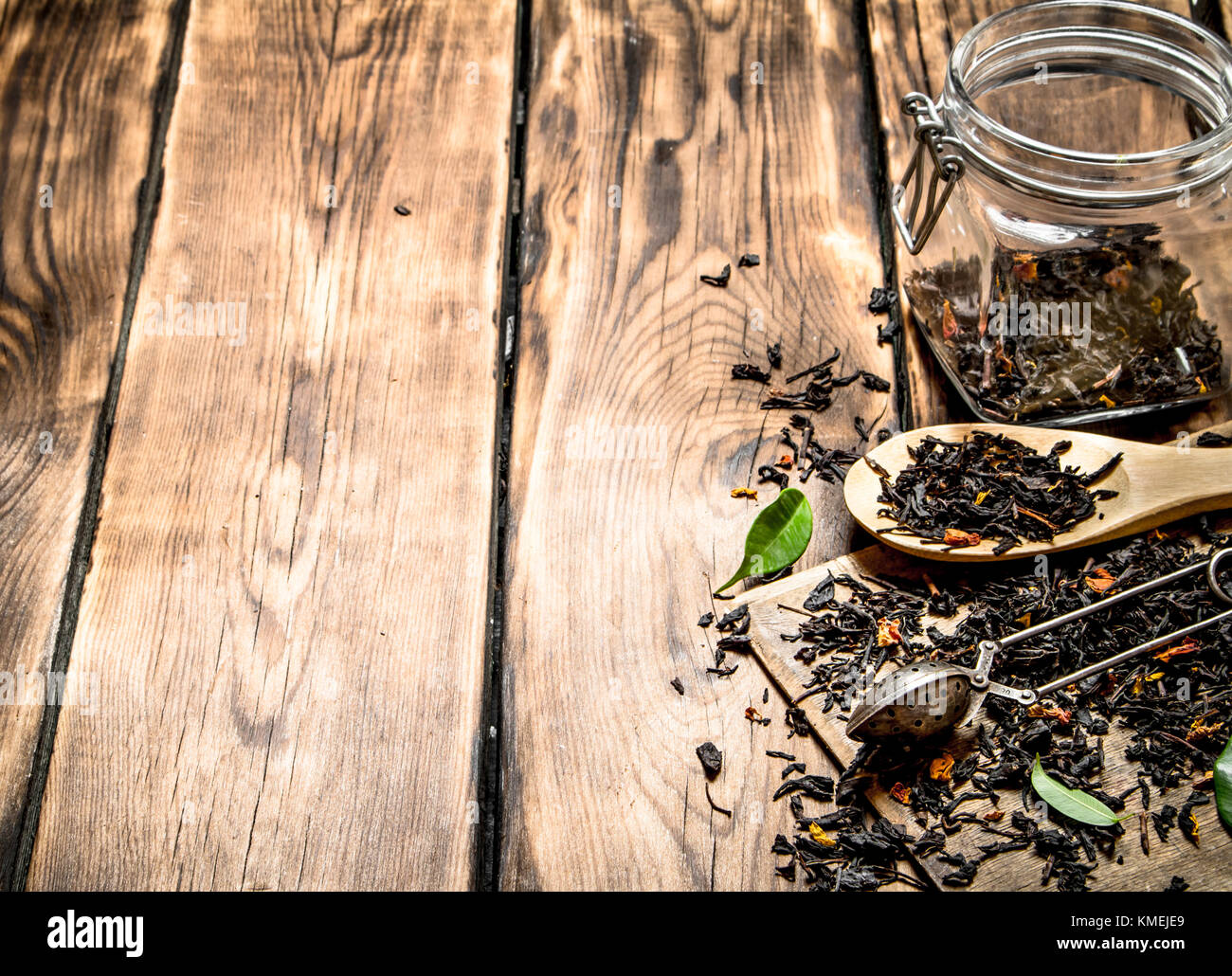 Download Dried Tea Jar With A Tea Spoon And Green Leaves On Wooden Stock Photo Alamy Yellowimages Mockups
