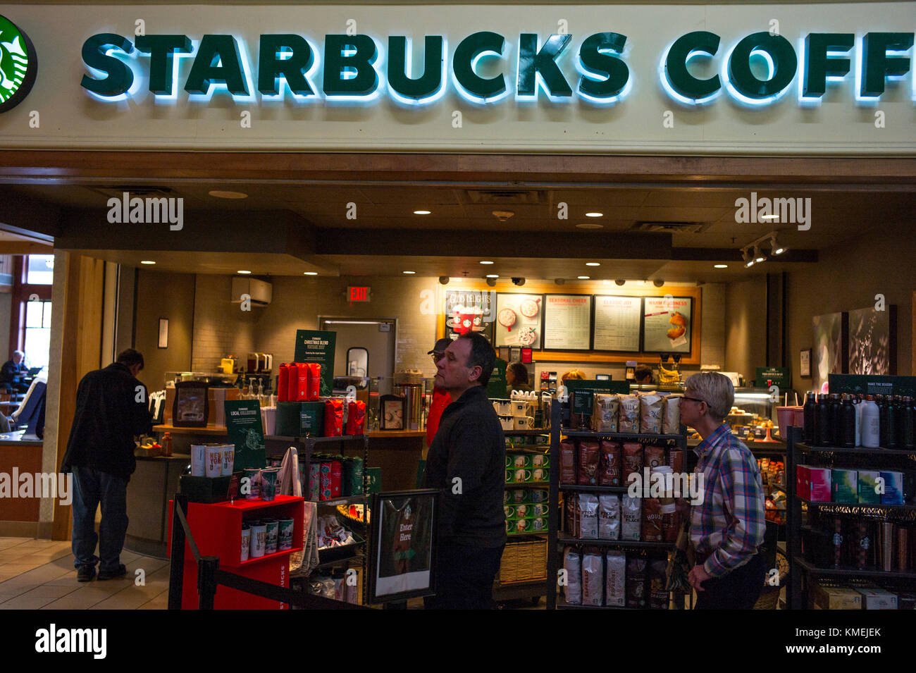 Customers stand in line at a Starbucks Coffee Shop inside the New Baltimore travel stop along the New York State Thruway  in Coxsackie, New York. Stock Photo