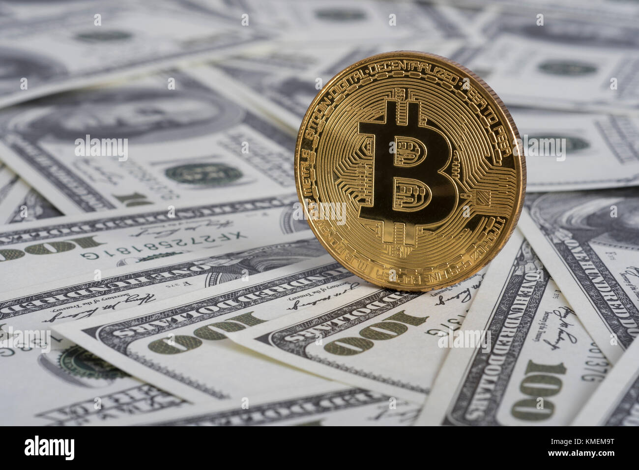 Gold-colored Bitcoin cryptocurrency with US $100 Franklin bills - Bitcoin  values reaching high levels in 2021 / $50,000+. Franklin C notes Stock  Photo - Alamy