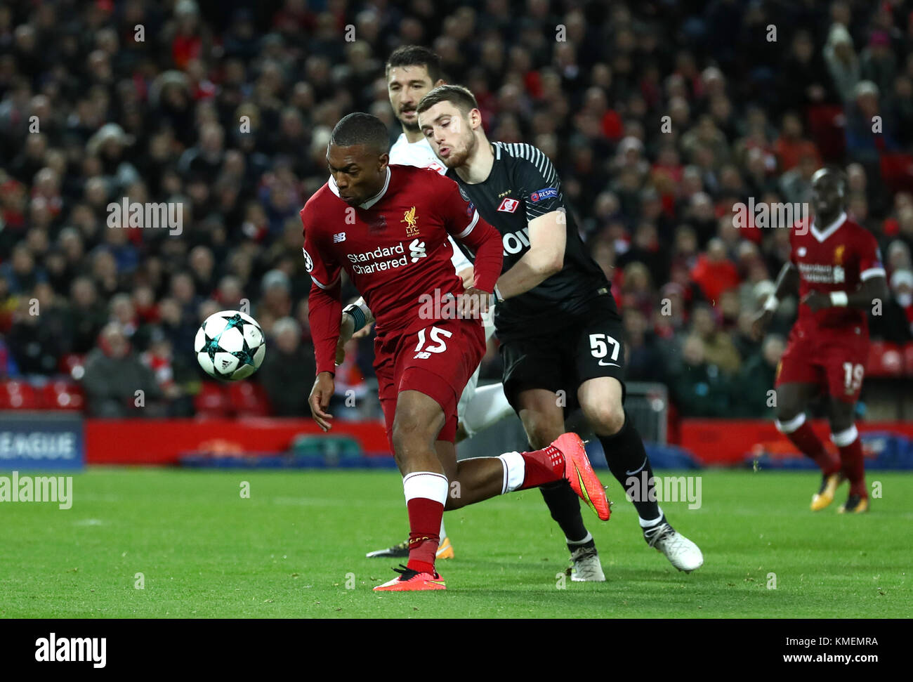 Liverpool's Daniel Sturridge (left) battles for the ball with Spartak Moscow's Alexander Selikhov during the UEFA Champions League, Group E match at Anfield, Liverpool. Stock Photo