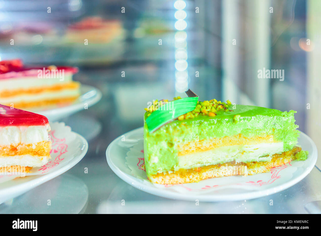 Pistachio dessert in the fridge on display at the cafe in Positano town, Amalfi coast, Italy