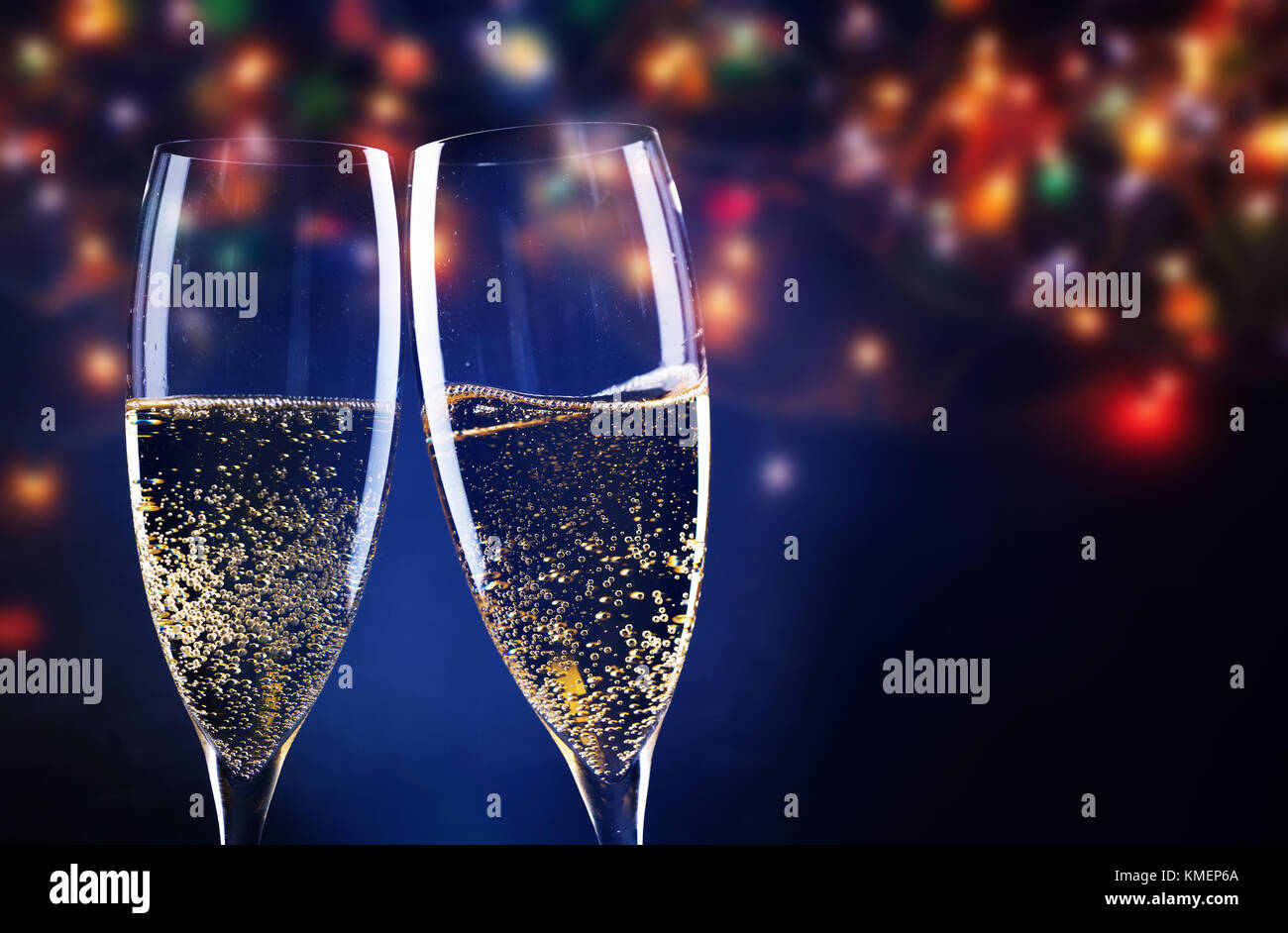 two champagne glasses ready to bring in the New Year Stock Photo - Alamy