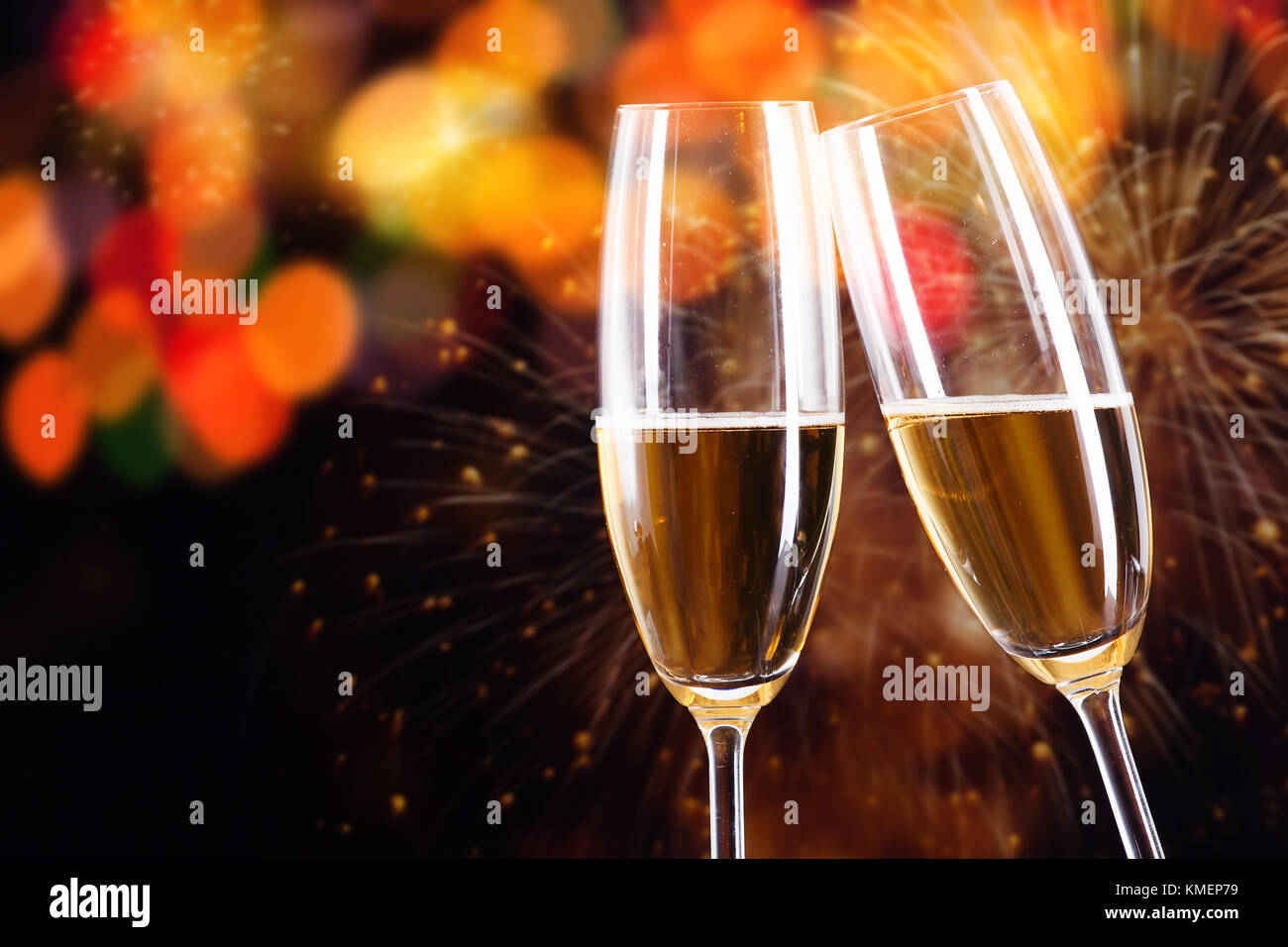two champagne glasses ready to bring in the New Year Stock Photo