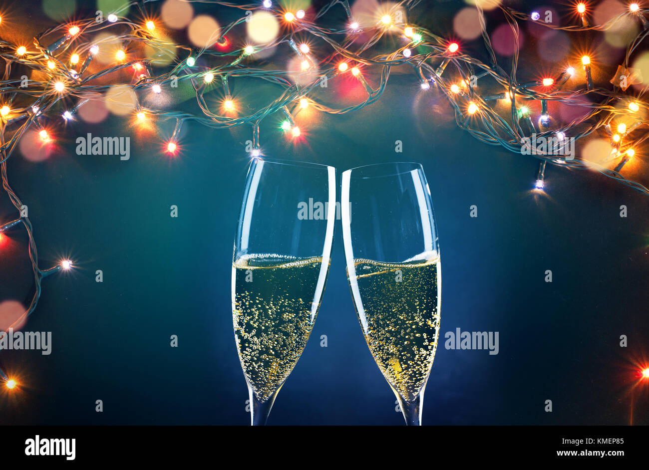 two champagne glasses ready to bring in the New Year Stock Photo - Alamy