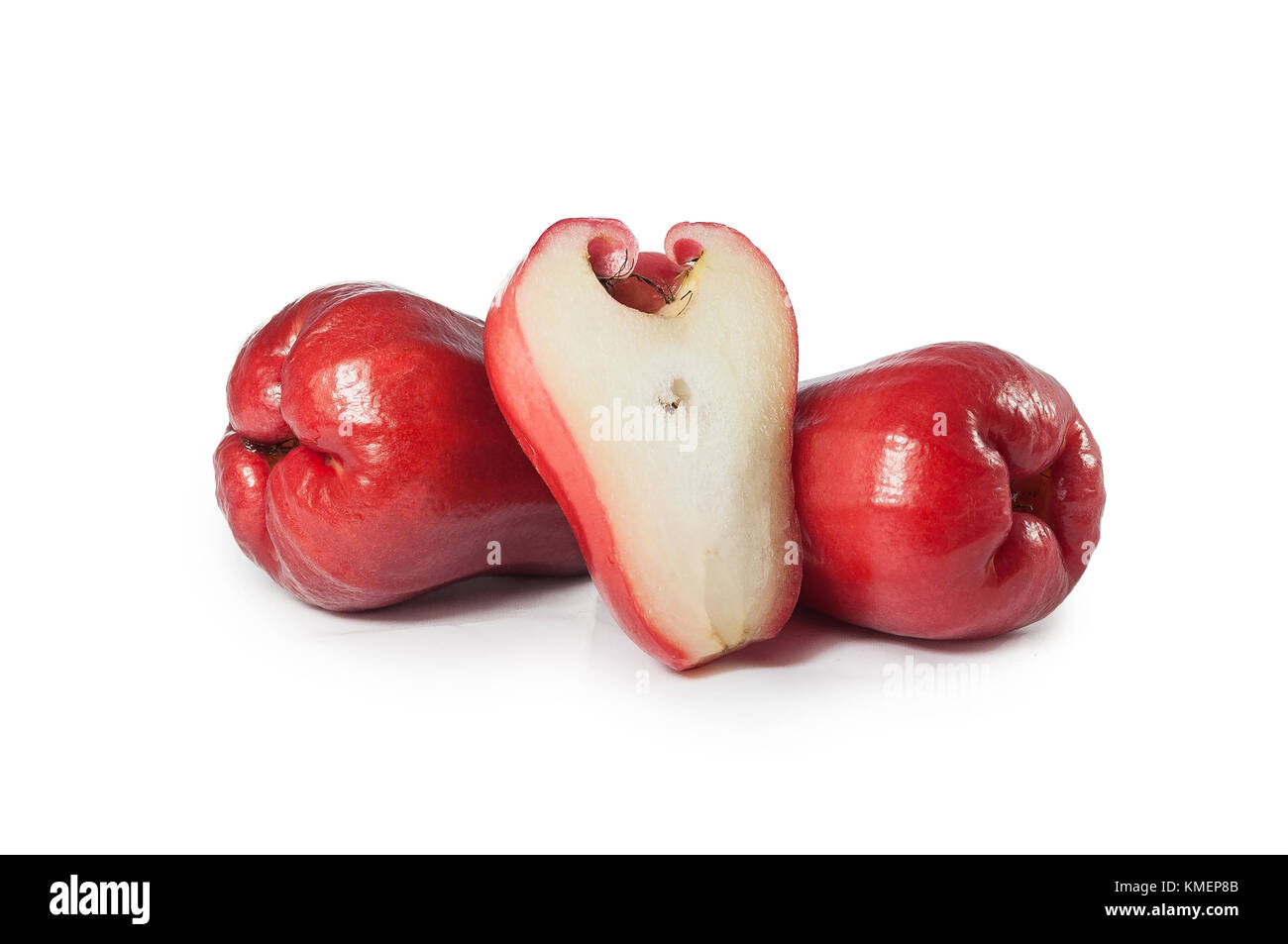 Fresh delicious red rose apples with one pieces cut in haft on isolated