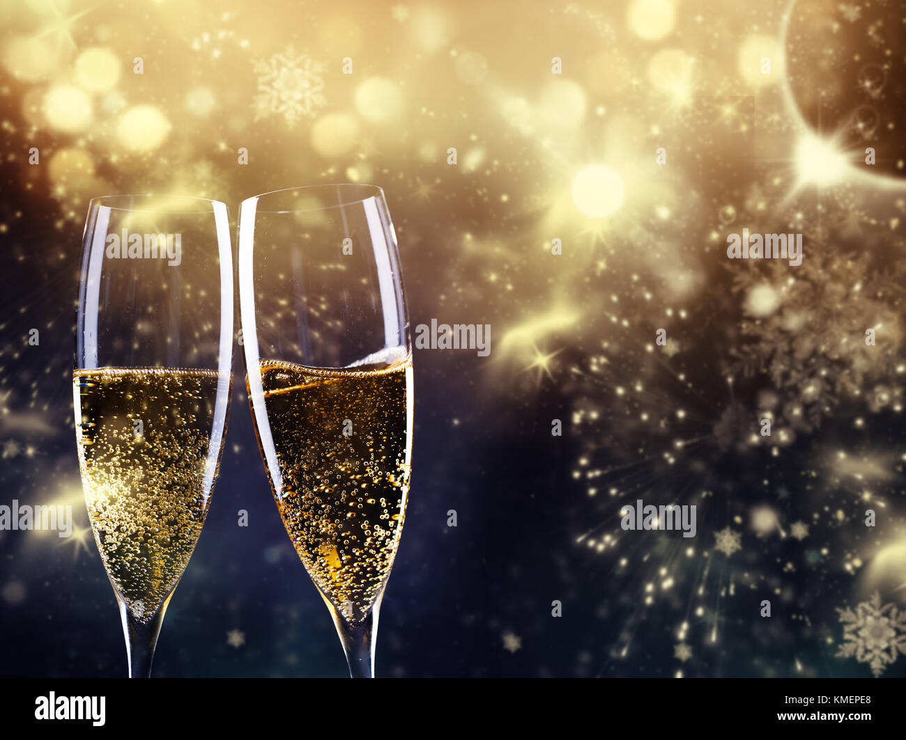 two champagne glasses ready to bring in the New Year Stock Photo - Alamy