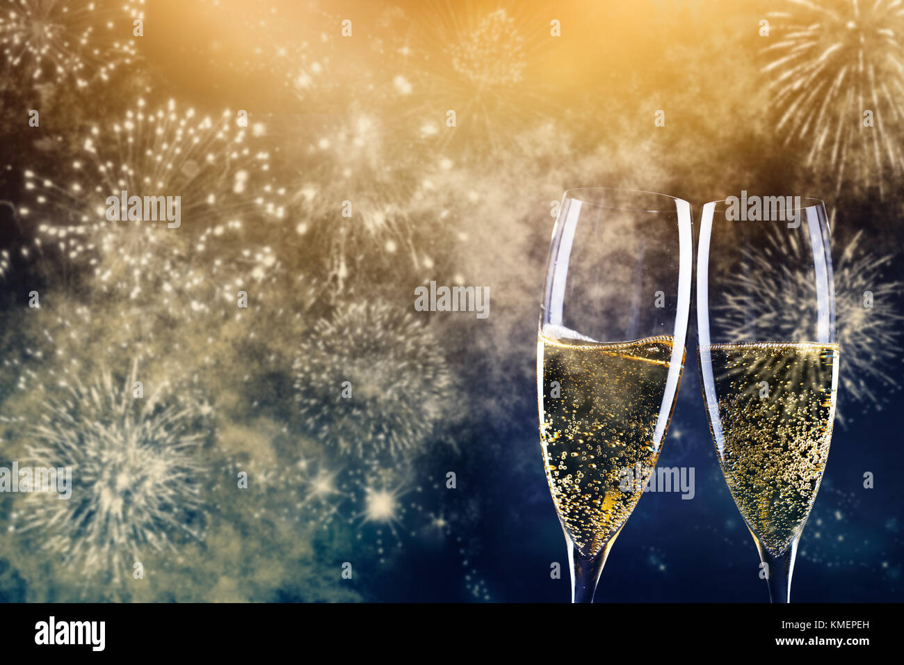 two champagne glasses ready to bring in the New Year Stock Photo - Alamy
