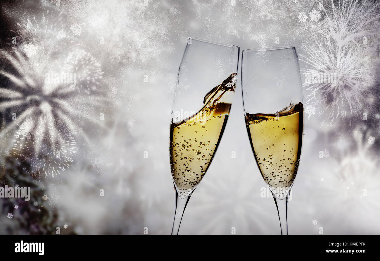 two champagne glasses ready to bring in the New Year Stock Photo - Alamy