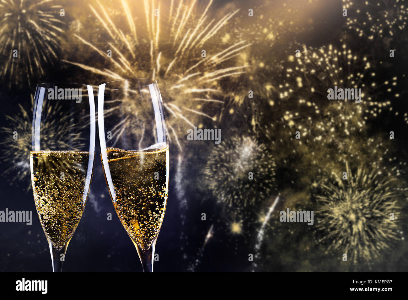 two champagne glasses ready to bring in the New Year Stock Photo - Alamy