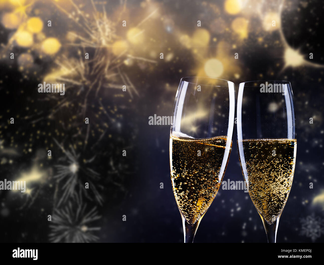 two champagne glasses ready to bring in the New Year Stock Photo - Alamy
