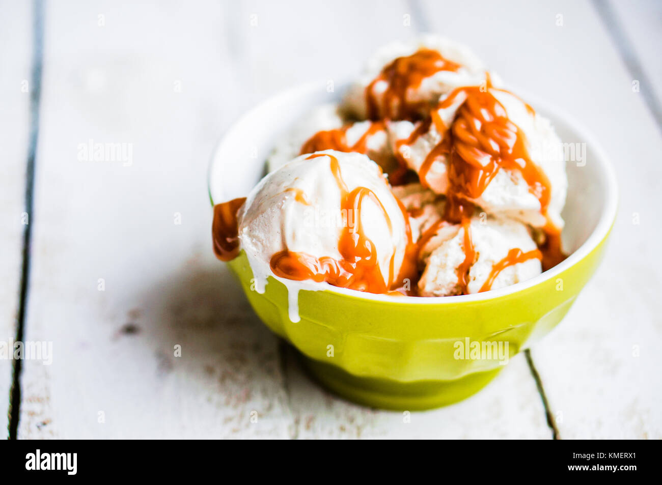 Vanilla Icecream Wirh Caramel Sauce On White Background Stock Photo - Alamy