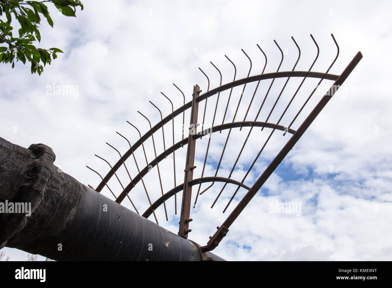 Anti climb device over pipe in Cheshire England UK Stock Photo