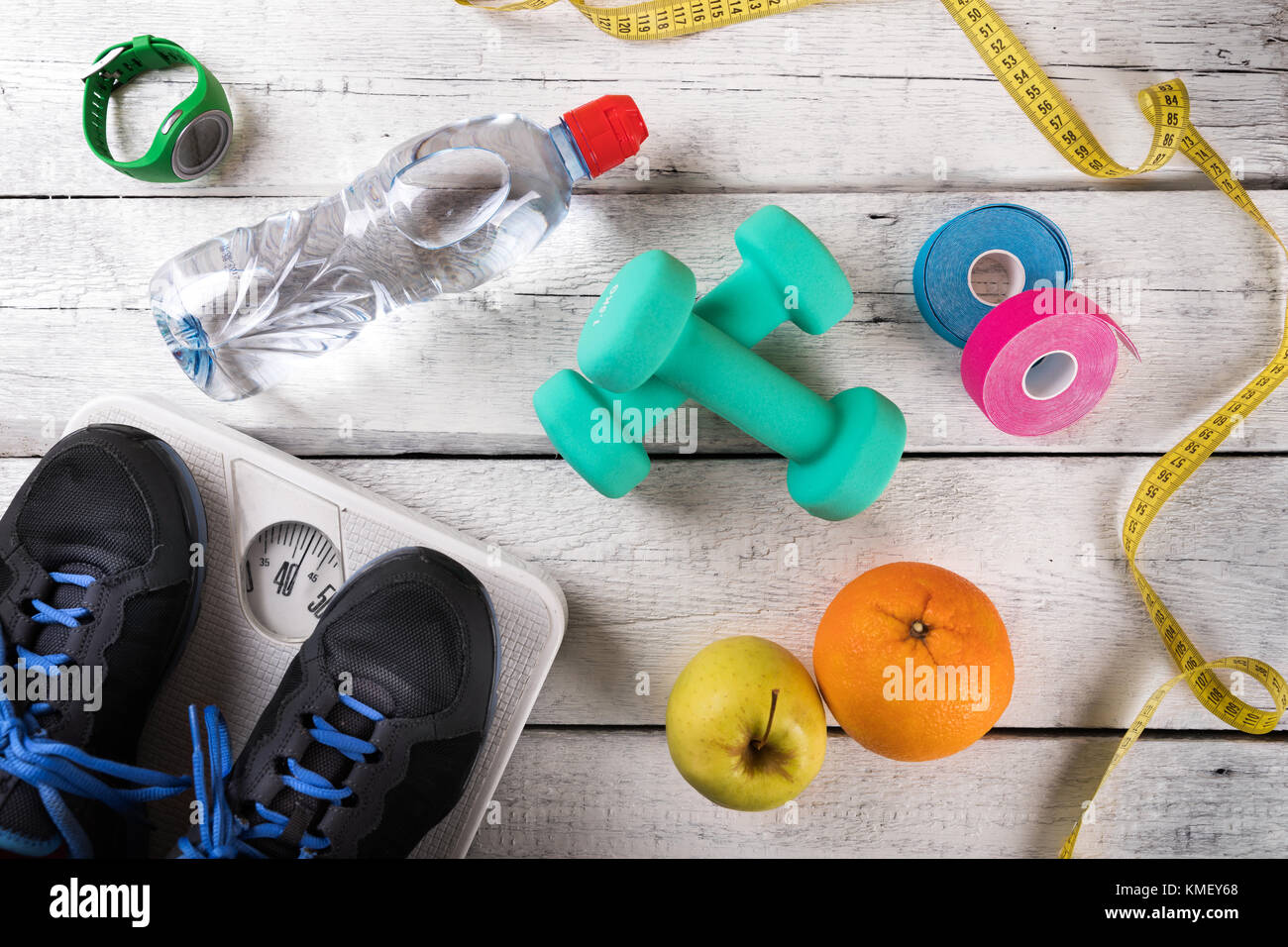 fitness equipment and accessories on white wood background. flat lay Stock Photo