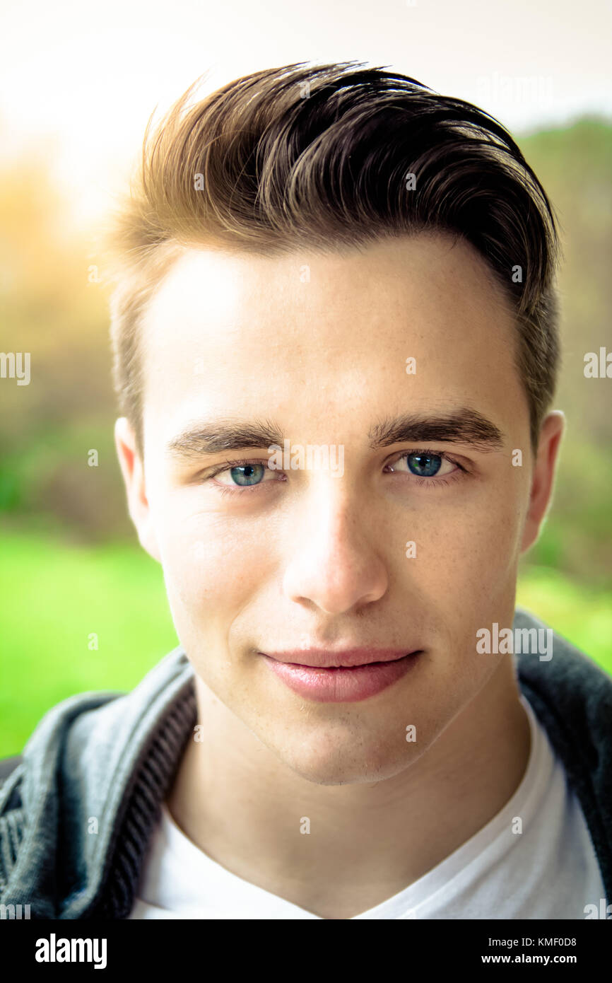 Portrait Of A Nice Young Attractive Man With Blue Eyes Stock Photo