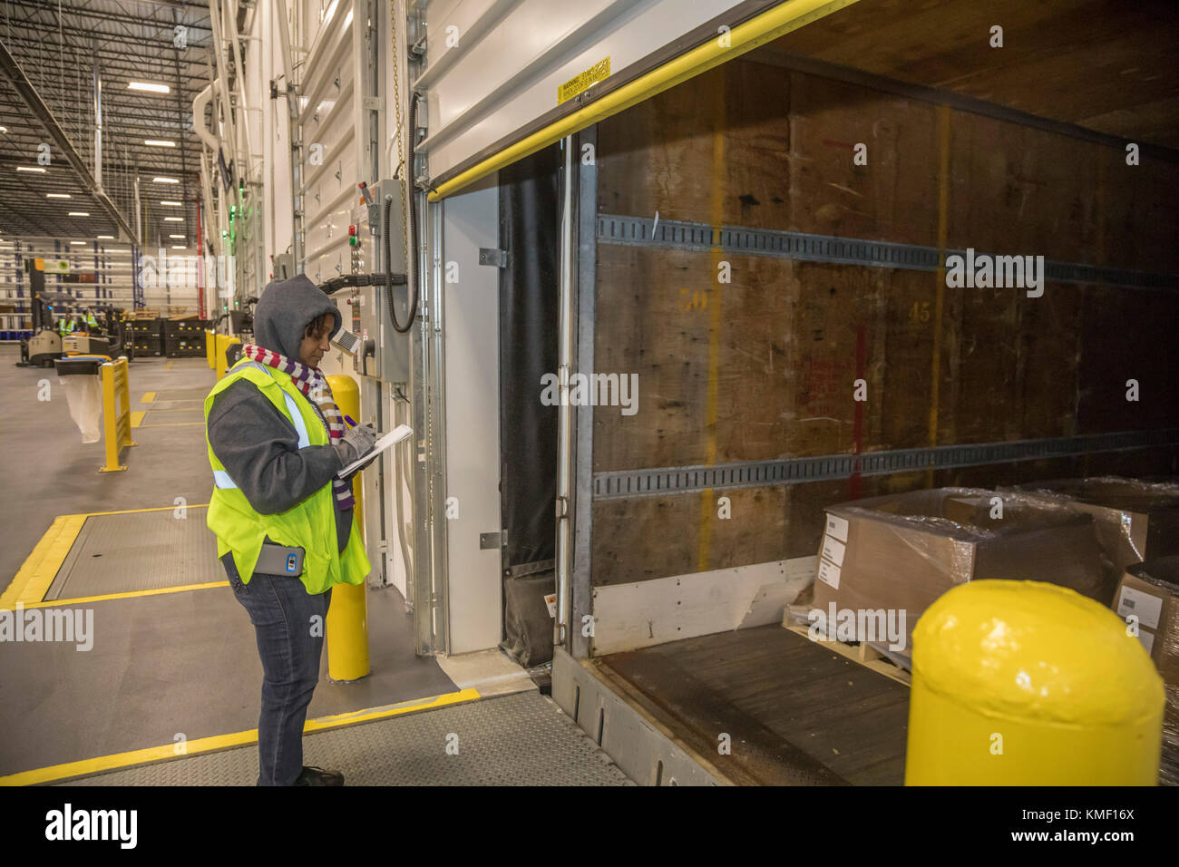 Romulus, Michigan A dispatcher checks the contents of trailers at a