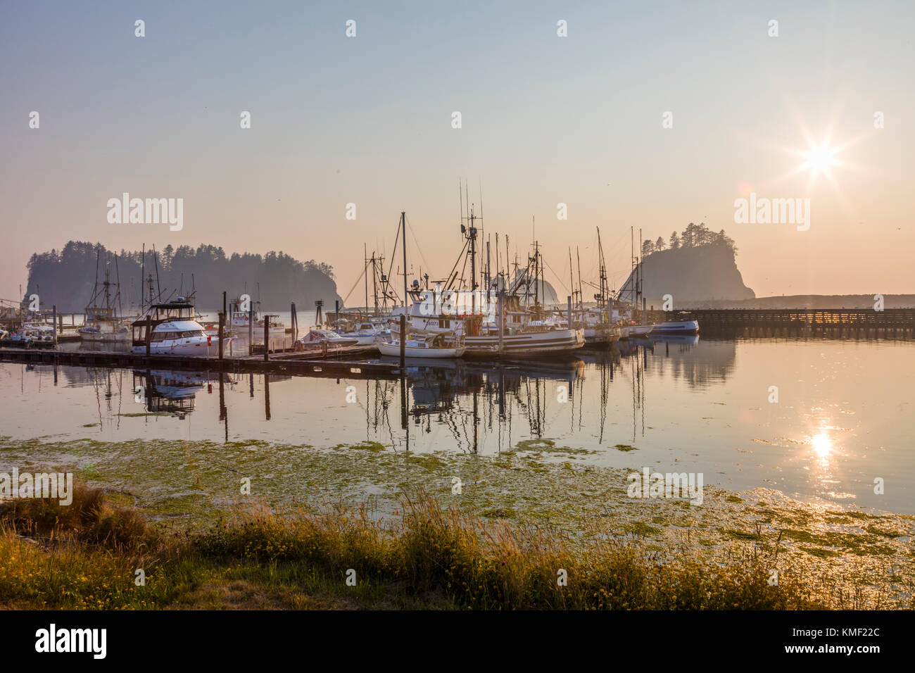 Fishing boats on foggy day in marina in town of La Push on the Quileute Indian Reservation in Washington State in the United States Stock Photo