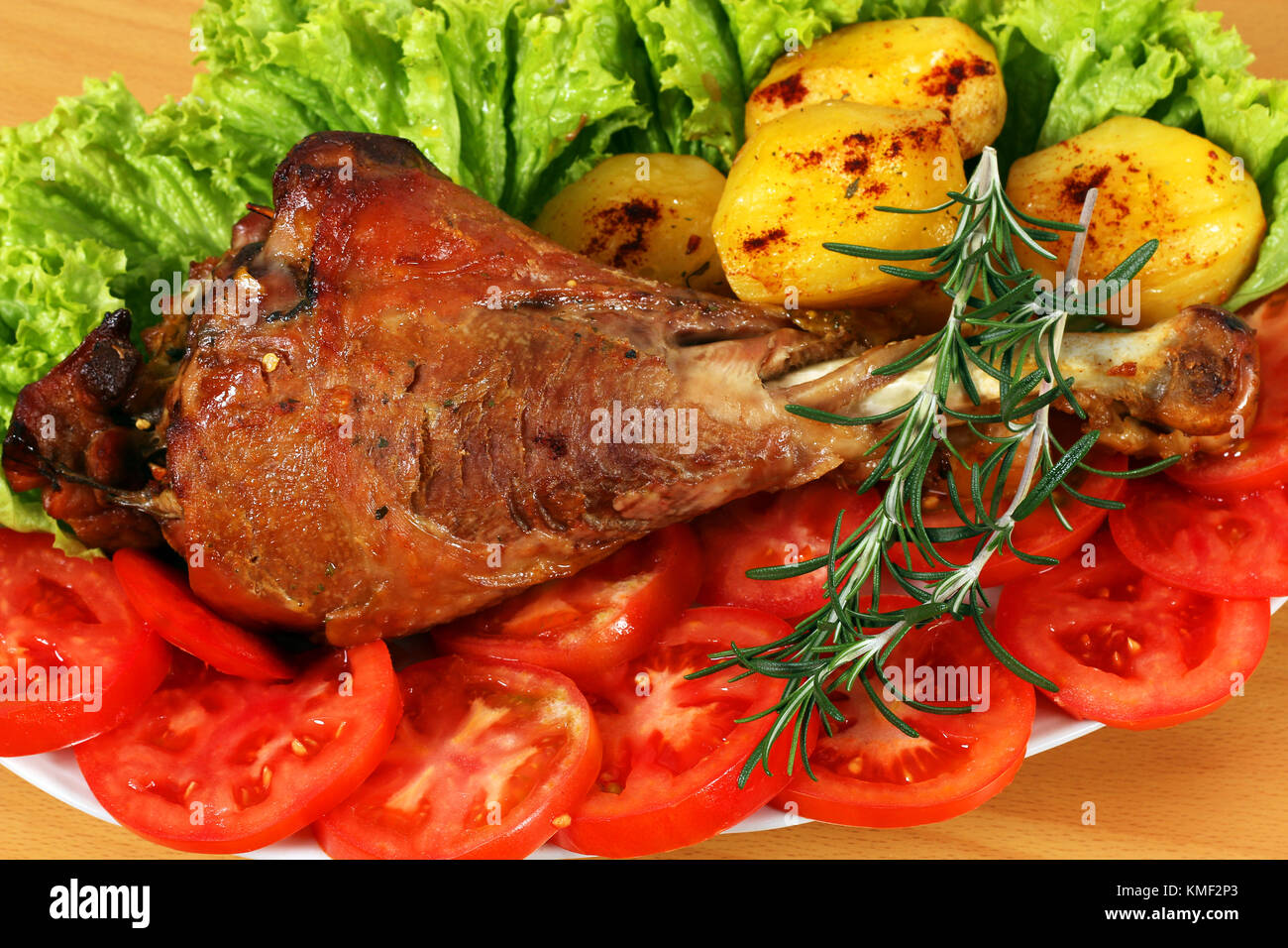 roasted turkey drumstick with vegetables closeup Stock Photo