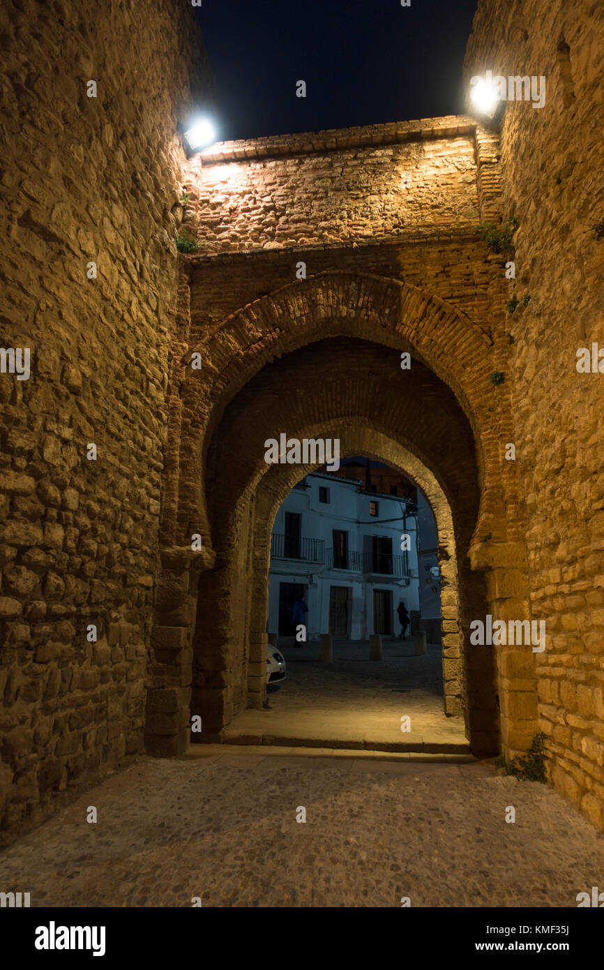 Ancient gateway in city walls, Puerta de Almocabar, Horseshoe arch, Ronda, Andalusia, Spain. Stock Photo