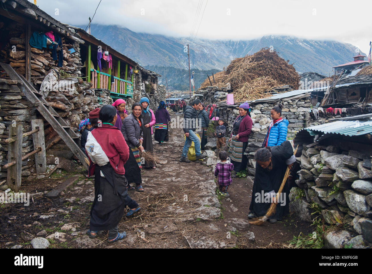 Villagers in the old village of Samagaon, a Tibetan area in the Manaslu region, Nepal Stock Photo