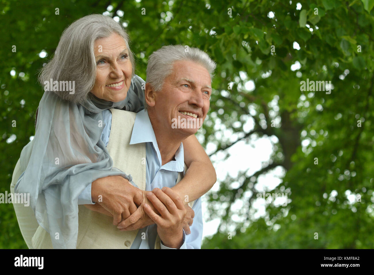 caucasian senior couple in the park Stock Photo - Alamy