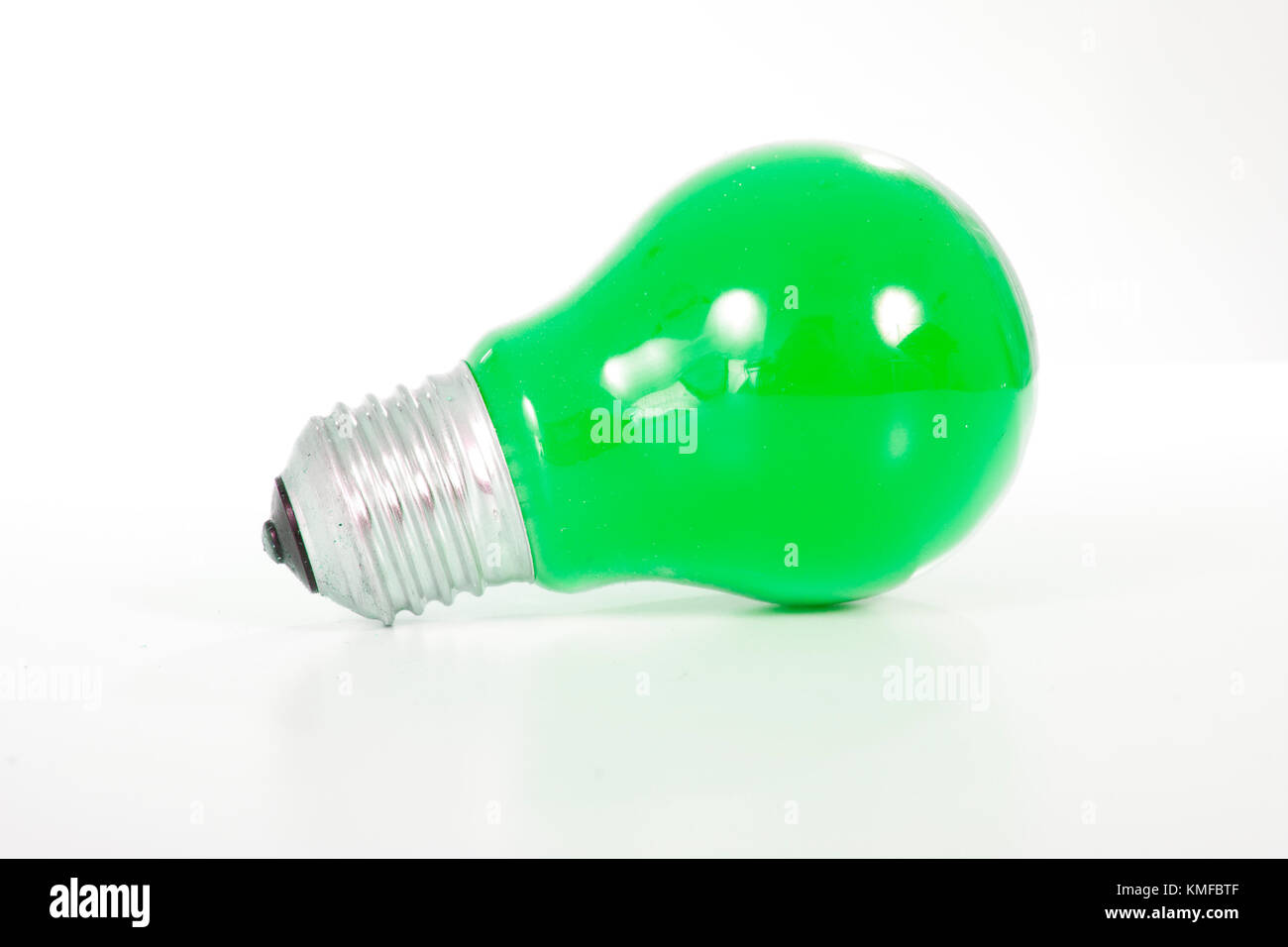 Green light bulb. Classic shape bulb with green color Stock Photo Alamy