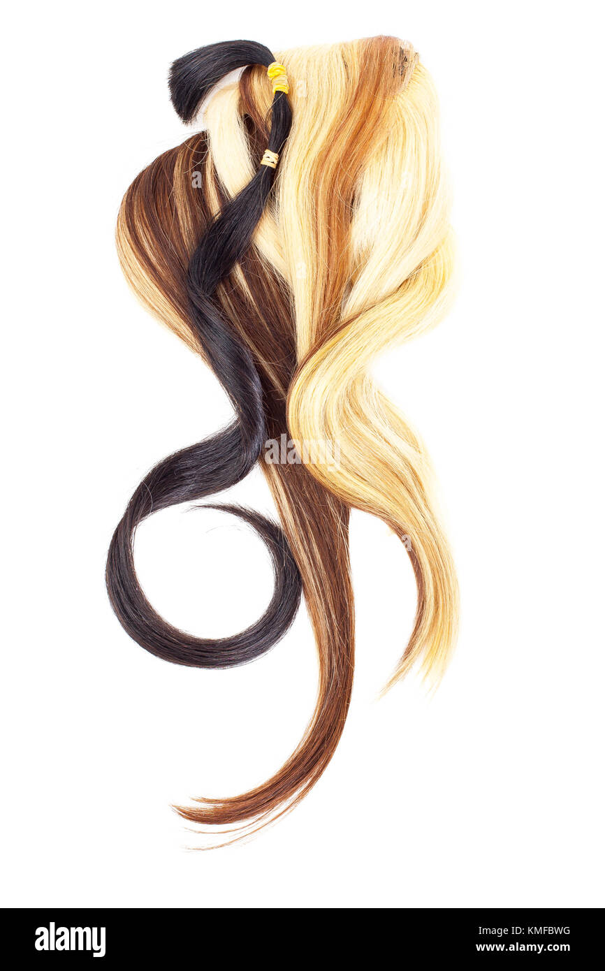 Real woman hair texture. Human hair weft, Dry hair with silky volumes. Real european human hair wallpaper texture. Brown blond dark blonde and black. Stock Photo