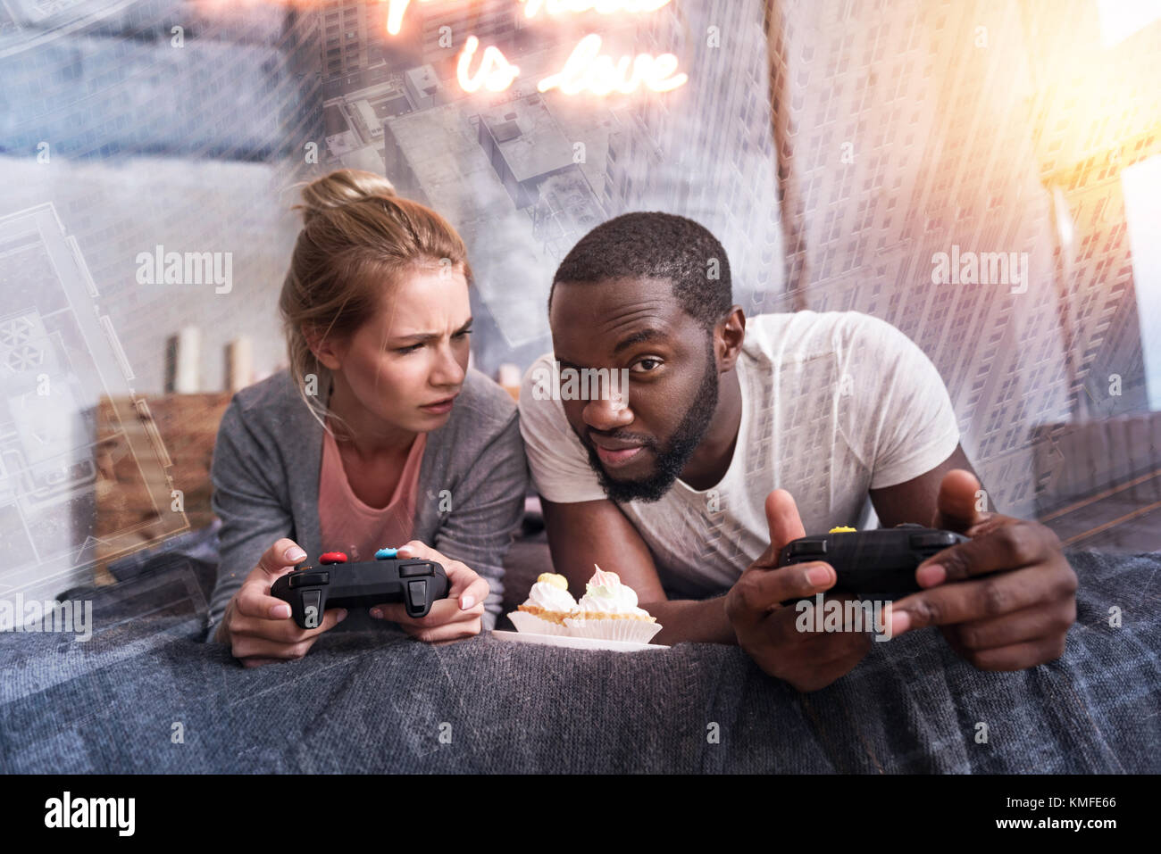 Pleasant handsome man playing with his girlfriend Stock Photo