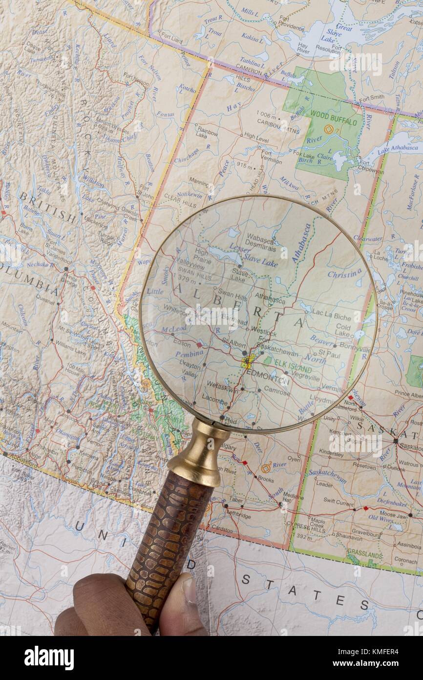 Magnifying Map magnifying glass and map Stock Photo - Alamy
