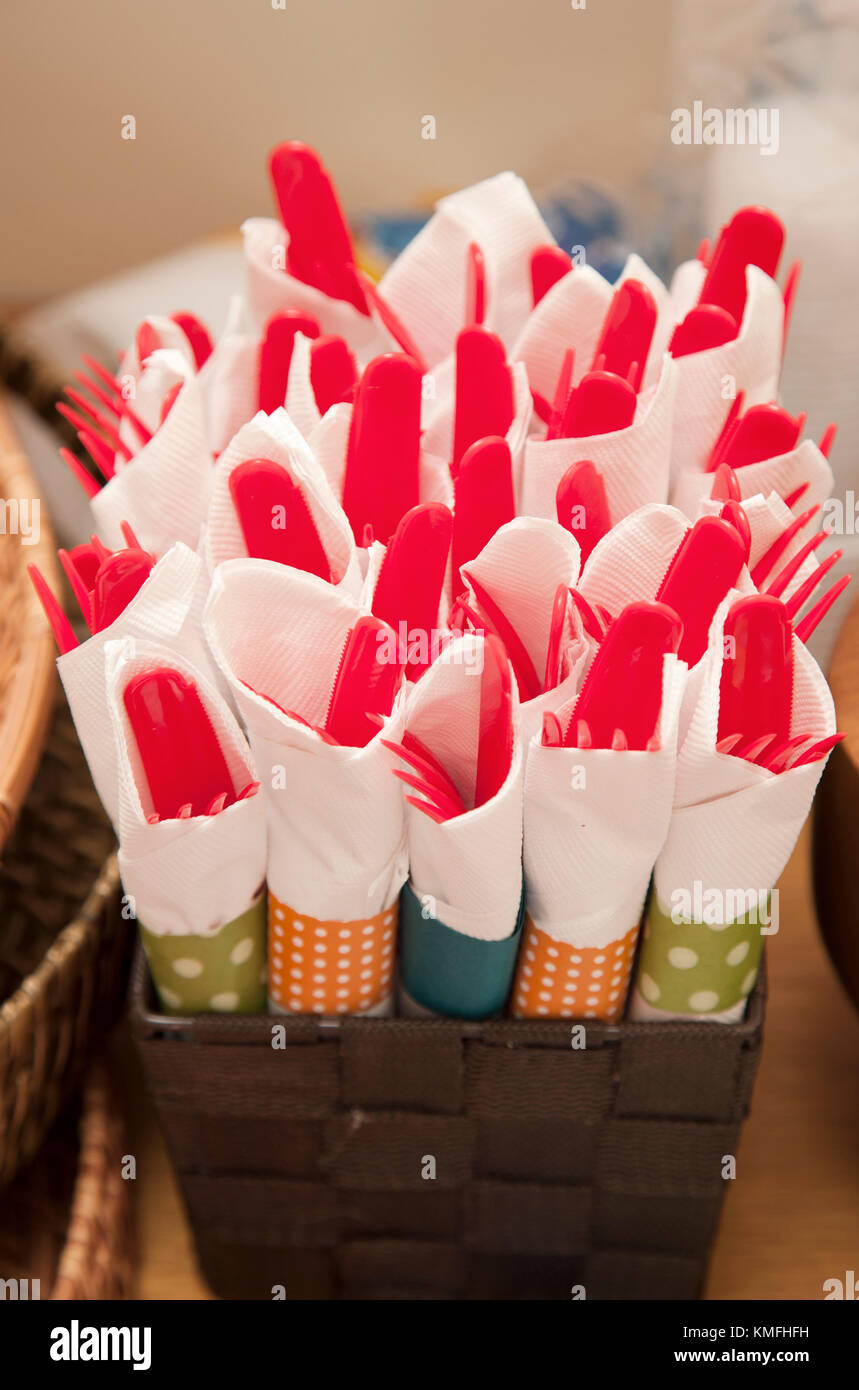 plastic utensils wrapped in pretty napkins at a party Stock Photo Alamy