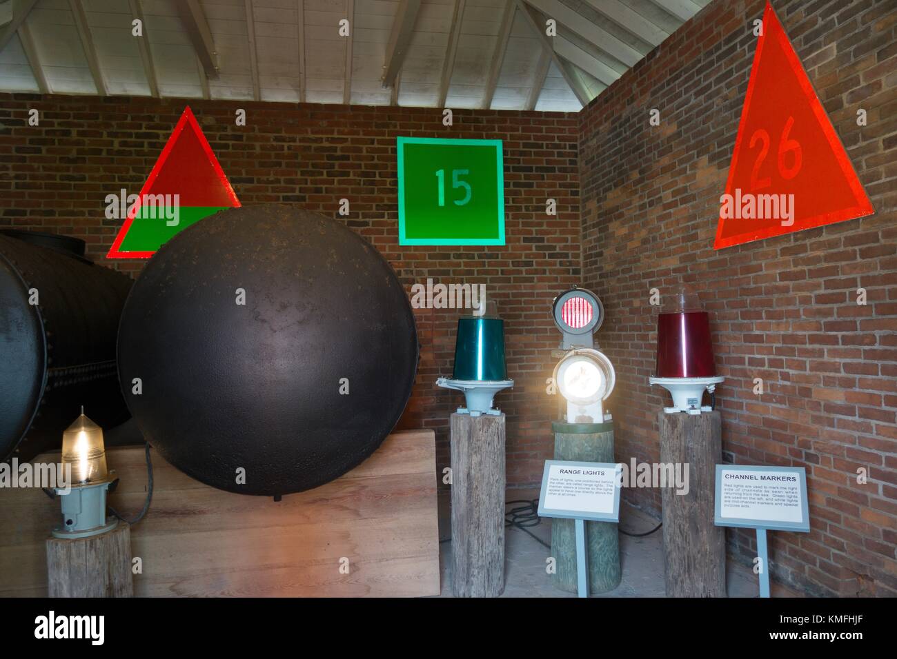 A display of channel markers and range lights at the Ponce Inlet Lighthouse and Museum in Ponce
