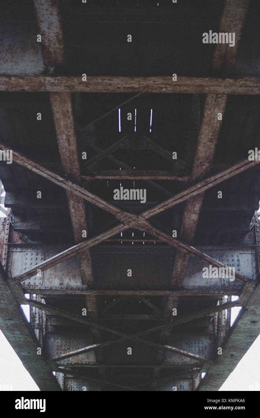 railway bridge. Bottom view. Industrial mood. Stock Photo