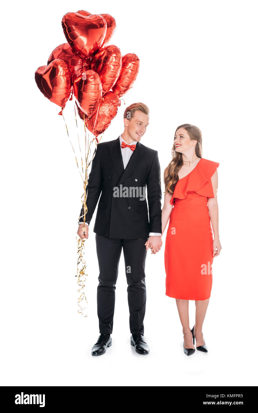 couple with heart shaped balloons Stock Photo - Alamy