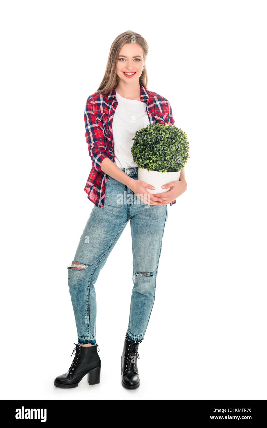 girl with green plant in pot Stock Photo - Alamy