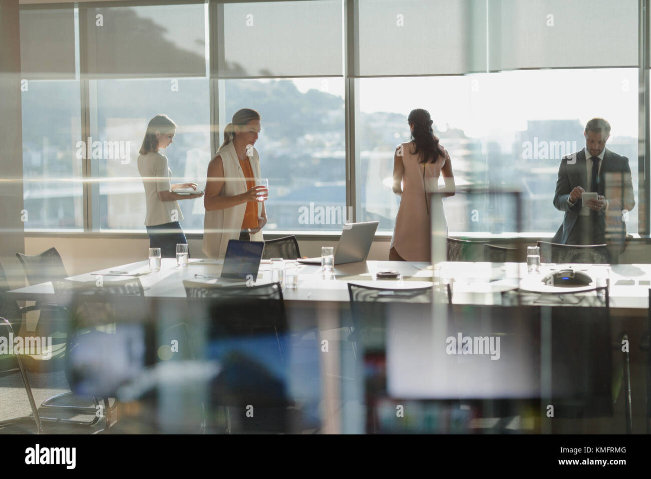 Business people working in conference room Stock Photo