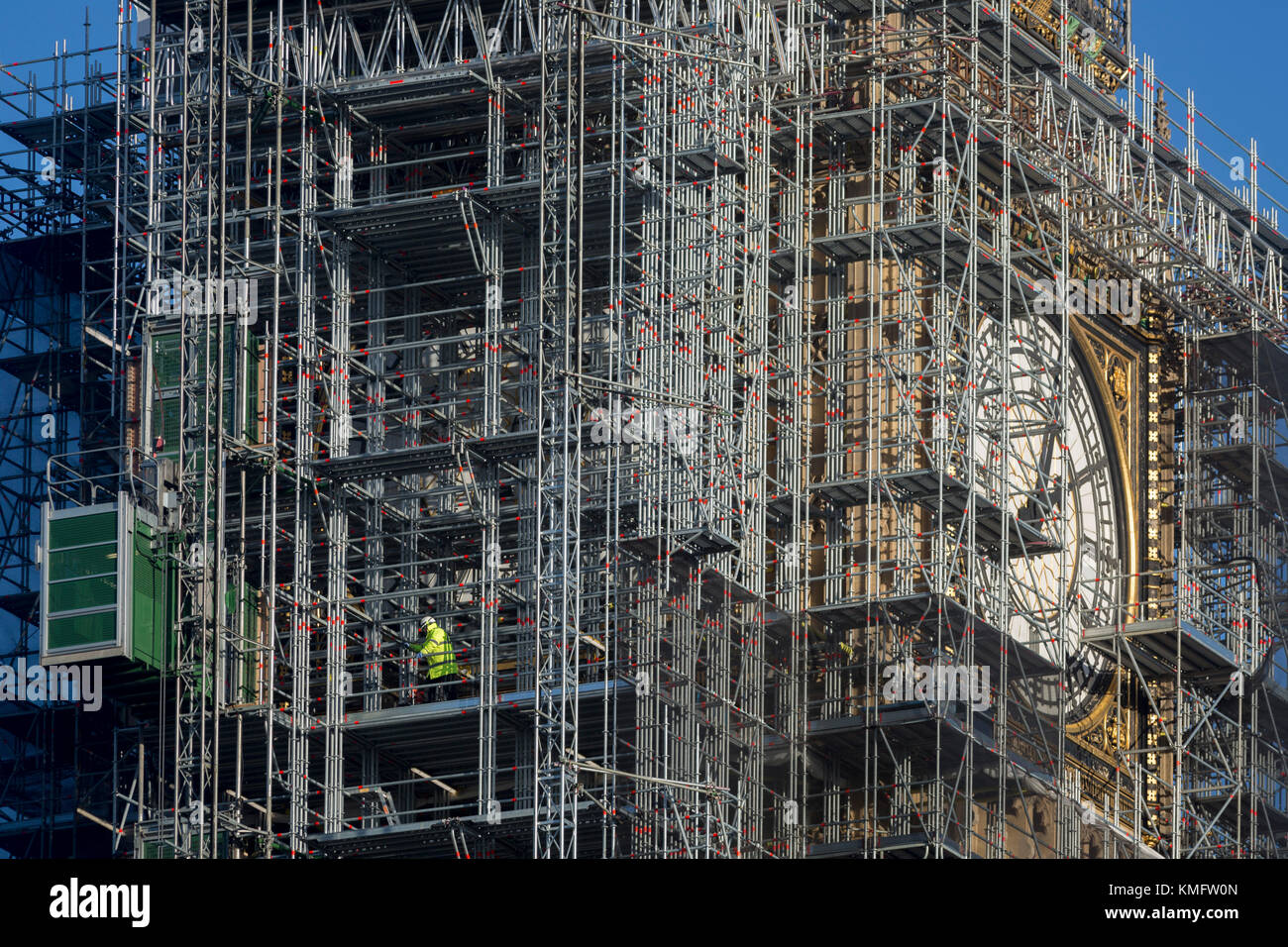 The Elizabeth Tower that holds the now silent Big Ben bell, along with the the Houses of Parliament, are covered in scaffolding,  on 1st December 2017, in Westminster, London, England. The bell will remain silent during this renovation by contractor Sir Robert McAlpine until 2021 and the estimated cost of repairing the tower and other parts of the 19th century Gothic building, has doubled to £61m, authorities have said. Stock Photo