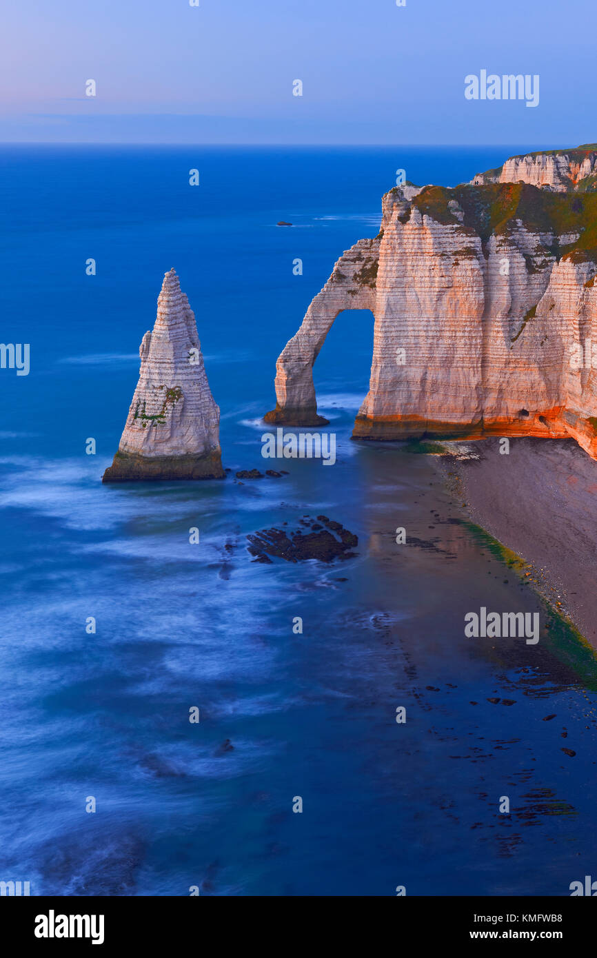 Etretat, Aval cliff , Falaise d´Aval, Natural Arch and Stone Beach, Normandy, Sunset, Seine Maritime, Upper Normandy, Haute Normandie, France. Stock Photo