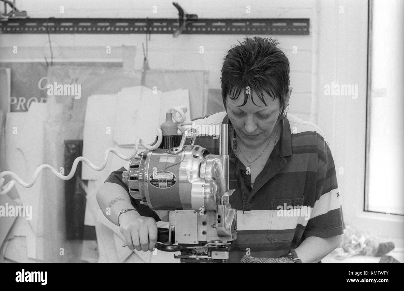 Female inmate at work in prison HMP Winchester, Winchester